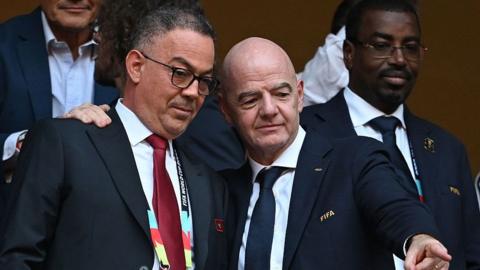 Fouzi Lekjaa, president of the Royal Moroccan Football Federation, with Fifa president Gianni Infantino during Morocco's World Cup game against the Netherlands in June 2026